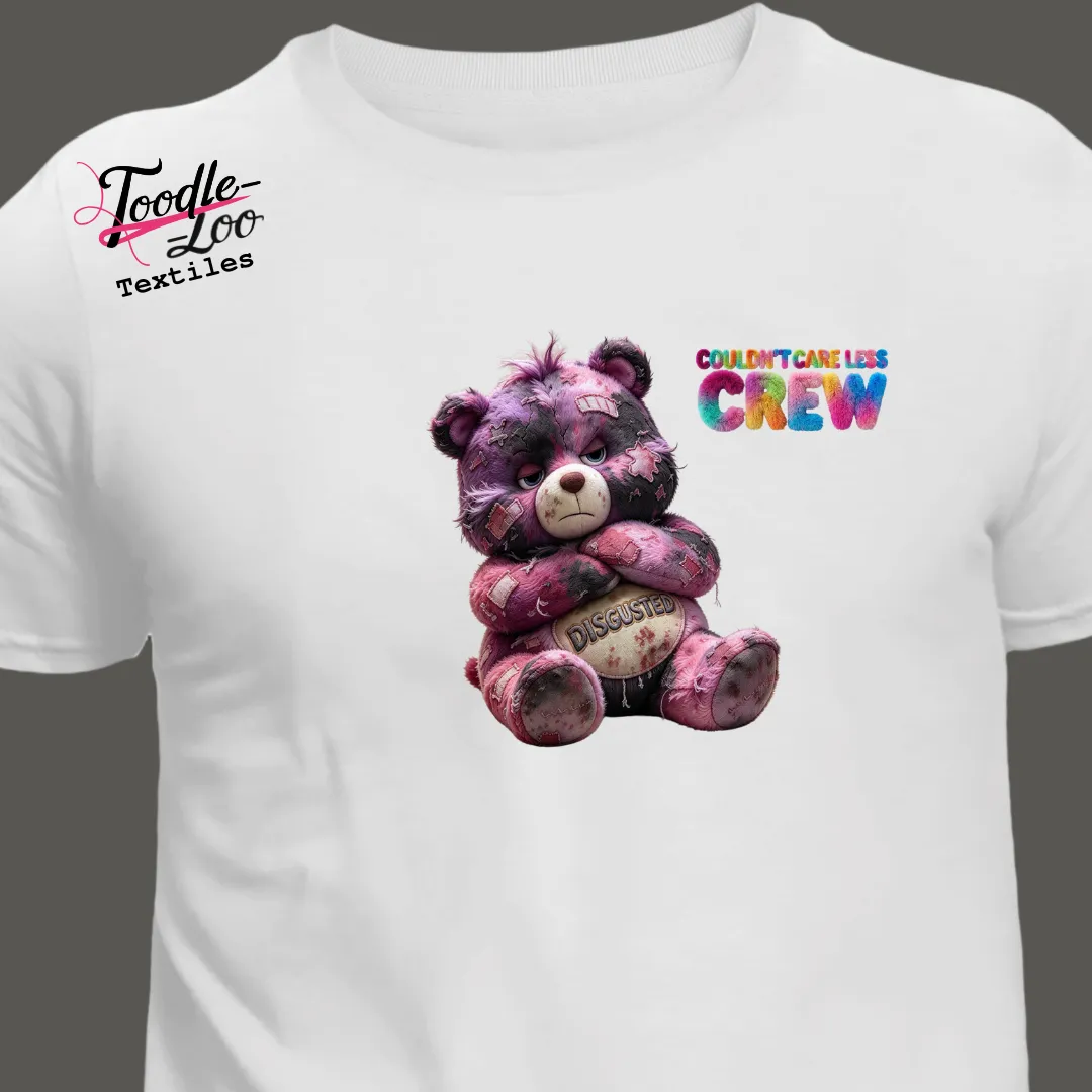 Disgusted bear design on a white tee — Couldn’t Care Less Crew DTF print, shown as an AI mock-up