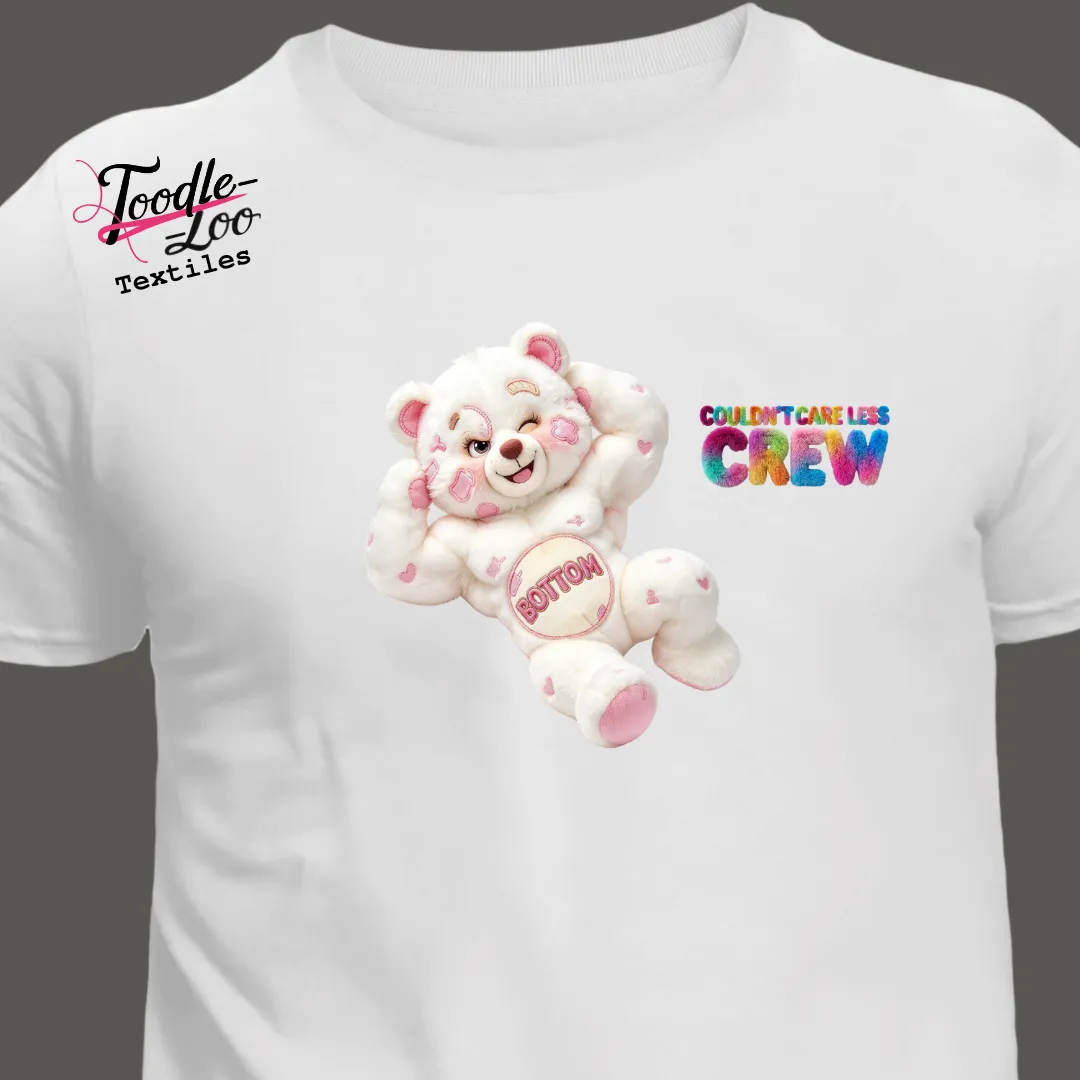 Bottom bear design v2, lying, on a white tee — Couldn’t Care Less Crew DTF print, shown as an AI mock-up